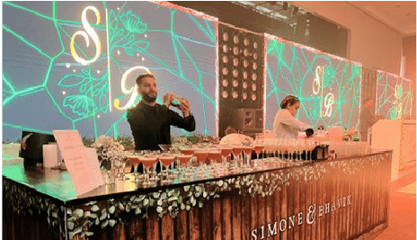 Guests raising glasses in a celebratory toast