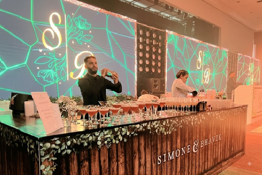 Professional bartenders running a fully managed event bar
